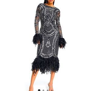 ASOS LUXE Black and Silver embellished dress
Size 6
Never worn